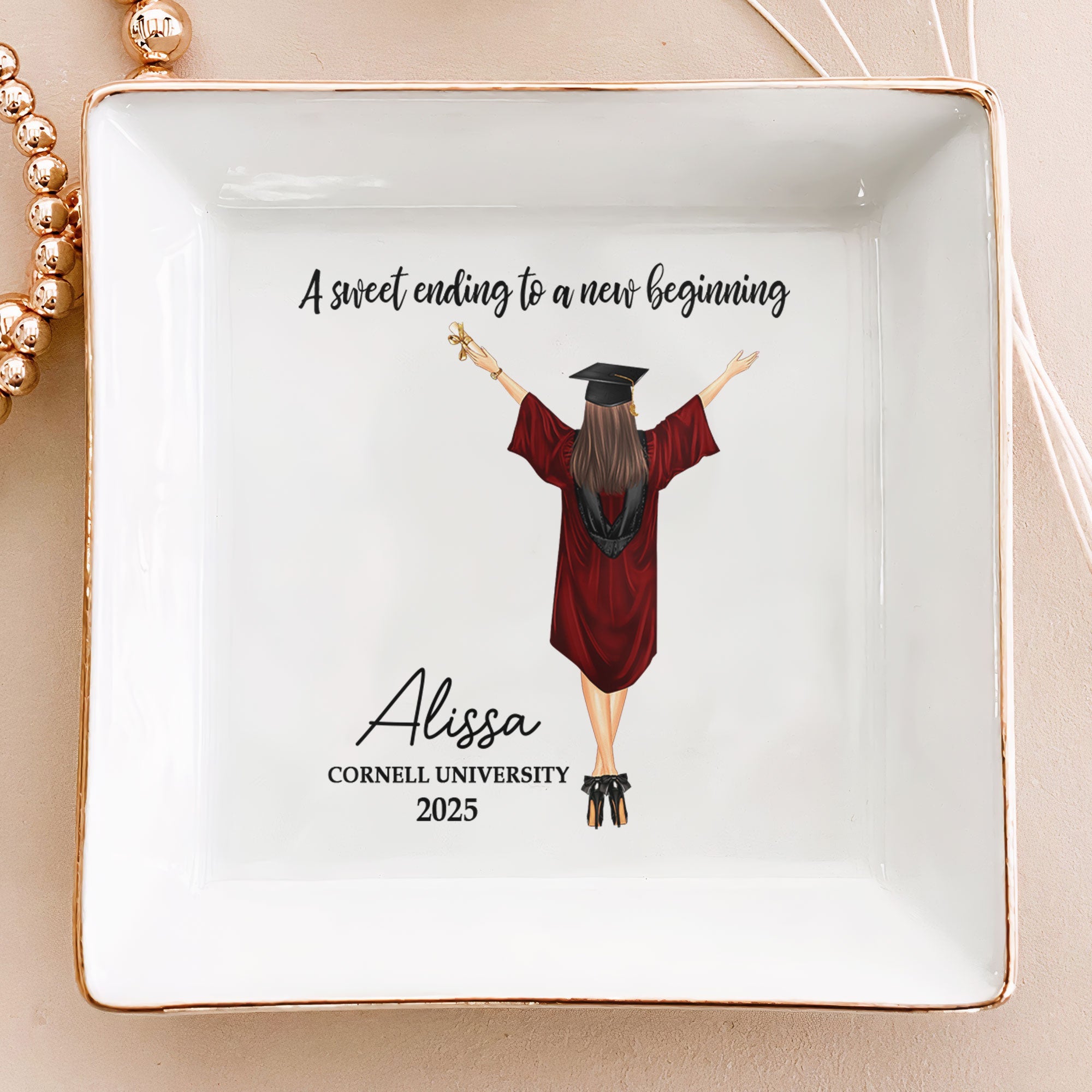 Personalized graduation jewelry dish with "A Sweet Ending To A New Beginning" and custom name & date.